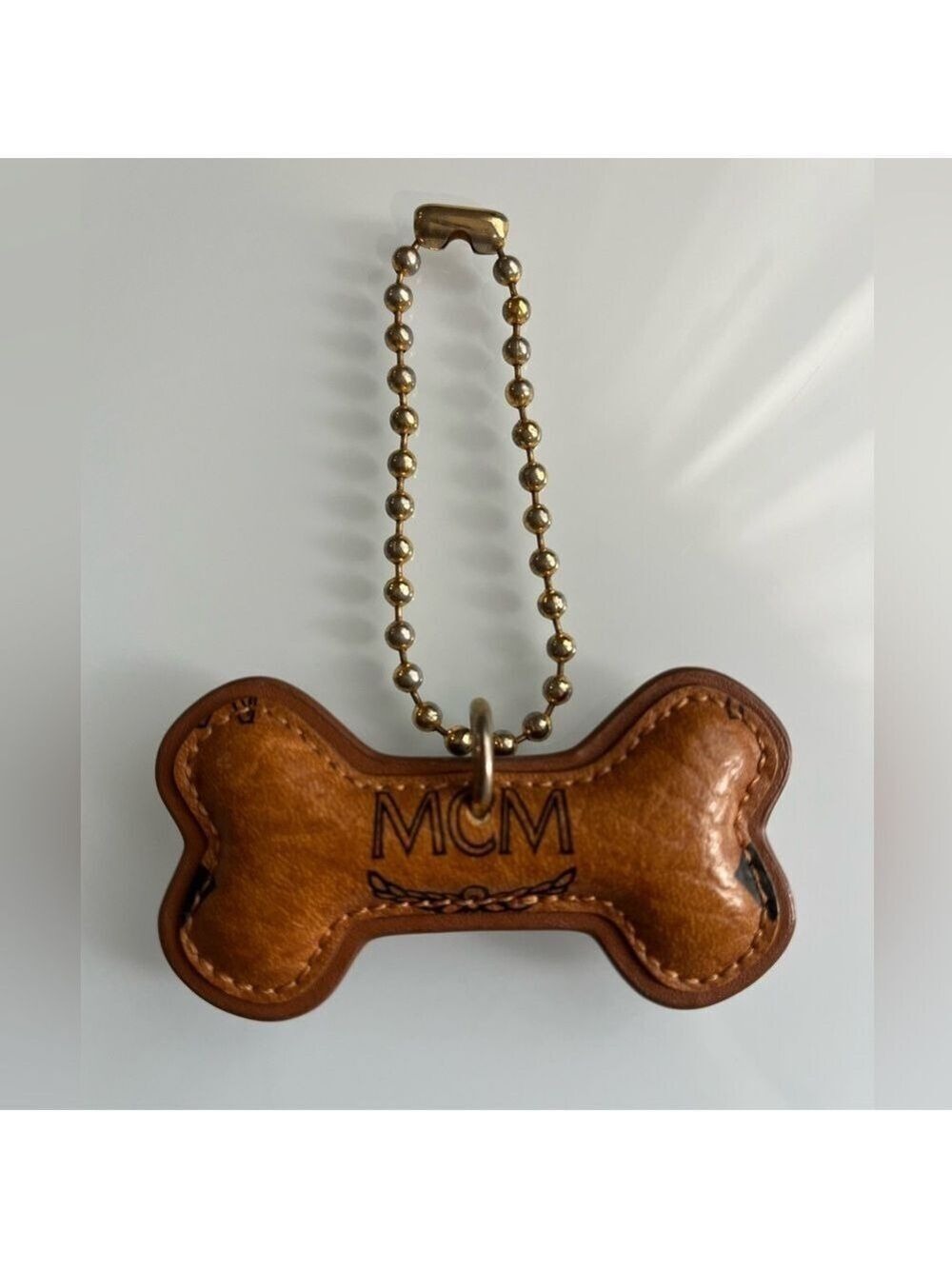 MCM COGNAC DOG BONE BAG CHARM